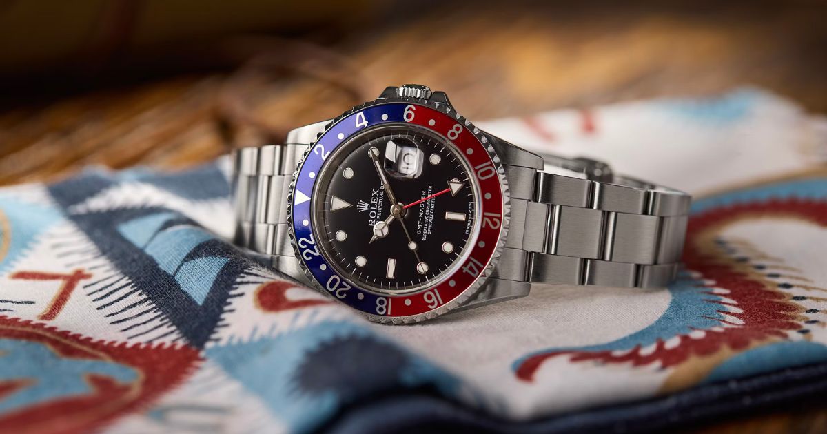 Rolex GMT-Master 16700 with iconic red and blue bezel.